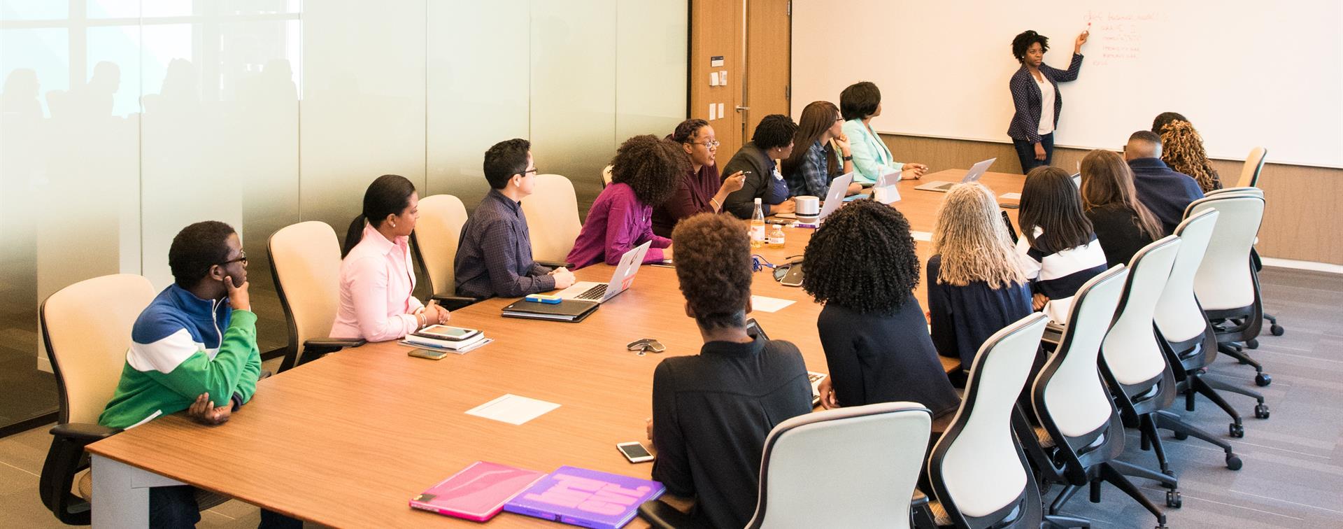 A group of people having a meeting